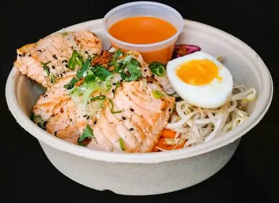 a bowl of salmon and rice bowl